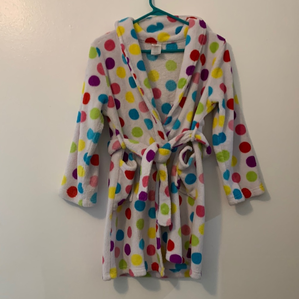 Girls bathrobe white with colored polka dots and has pockets